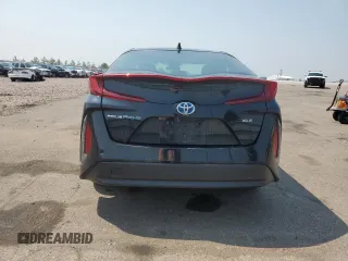 2021 Toyota Prius LE with VIN JTDKAMFP8M3170547, listed as a Copart auction lot 60262615 with 56,156 mi miles and Salvage title. Bid and sale history available at DreamBid. Image 6.
