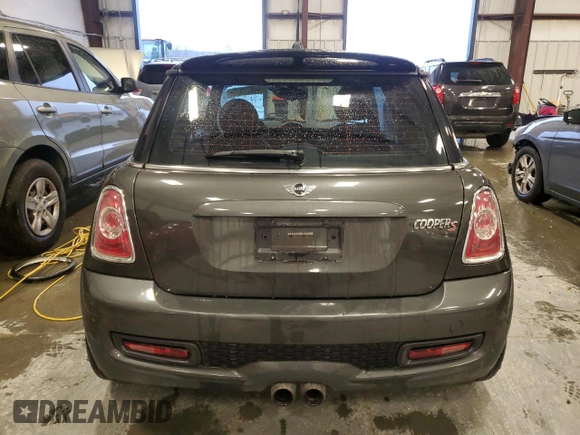 2013 MINI Hardtop S with VIN WMWSV3C53DT390693, listed as a Copart auction lot 44827925 with 131,411 mi miles and Salvage Title. Bid and sale history available at DreamBid. Image 6.