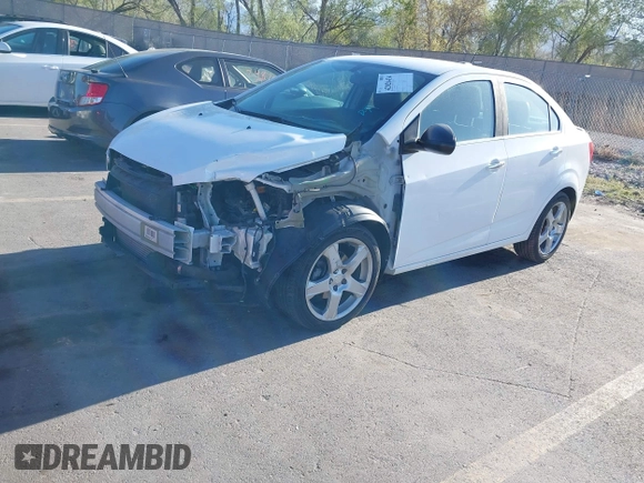 2016 Chevrolet Sonic LTZ z VIN 1G1JE5SB0G4144421, wystawiony jako IAAI lot #42020434 z przebiegiem 120 114 mil mil oraz . Historia ofert i sprzedaży dostępna na DreamBid. Obrazek 2.