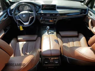 2016 BMW X5 xDrive50i with VIN 5UXKR6C59G0J81052, listed as a Copart auction lot 49572985 with 90,207 mi miles and Salvage Title. Bid and sale history available at carsss.com. Image 8.
