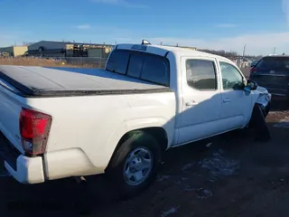 2023 Toyota Tacoma 4WD SR with VIN 3TMCZ5AN8PM648672, listed as a IAAI auction lot 41429412 with 11,731 mi miles. Bid and sale history available at carsss.com. Image 4.