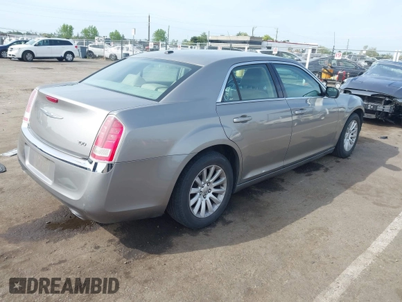 2014 Chrysler 300 with VIN 2C3CCAAG3EH322855, listed as a IAAI auction lot 42053129 with 172,687 mi miles. Bid and sale history available at carsss.com. Image 4.