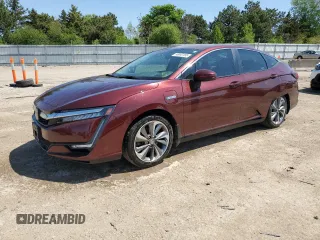 2018 Honda Clarity Touring z VIN JHMZC5F31JC001136, wystawiony jako Copart lot #56040165 z przebiegiem 63 654 mil mil oraz Szkoda całkowita • Salvage title. Historia ofert i sprzedaży dostępna na DreamBid. Obrazek 1.
