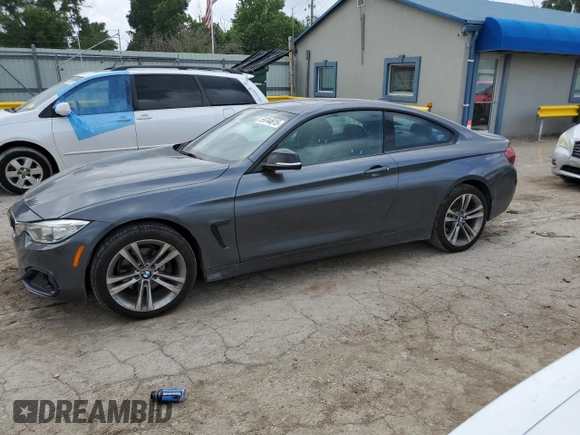 2014 BMW 4 Series 428i xDrive with VIN WBA3N5C51EF717379, listed as a Copart auction lot 59744615 with 112,800 mi miles and Clean title. Bid and sale history available at DreamBid. Image 1.