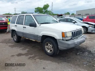 1998 Jeep Grand Cherokee Laredo with VIN 1J4GZ58S8WC372369, listed as a IAAI auction lot 42222447 with 223,748 mi miles and . Bid and sale history available at DreamBid. Image 1.