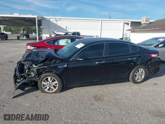 2016 Kia Optima LX with VIN 5XXGT4L31GG022844, listed as a IAAI auction lot 41240100 with 121,586 mi miles and . Bid and sale history available at DreamBid. Image 14.