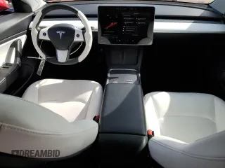 2021 Tesla Model 3 Standard Range Plus with VIN 5YJ3E1EA9MF870214, listed as a Copart auction lot 47702535 with 46,486 mi miles and Salvage Title. Bid and sale history available at DreamBid. Image 8.