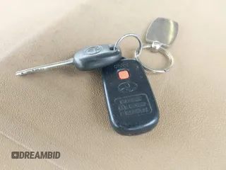 2003 Toyota MR2 z VIN JTDFR320430063623, wystawiony jako IAAI lot #42255385 z przebiegiem 140 134 mil mil oraz . Historia ofert i sprzedaży dostępna na DreamBid. Obrazek 11.