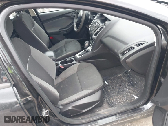 2012 Ford Focus SE z VIN 1FAHP3K27CL455211, wystawiony jako IAAI lot #42048868 z przebiegiem 164 474 mil mil oraz . Historia ofert i sprzedaży dostępna na DreamBid. Obrazek 5.