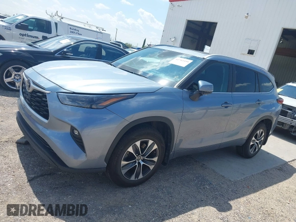2023 Toyota Highlander L with VIN 5TDKDRBH5PS012608, listed as a IAAI auction lot 42702499 with 61,129 mi miles and . Bid and sale history available at DreamBid. Image 14.