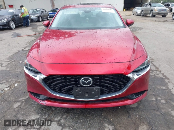 2021 Mazda 3 with VIN JM1BPBDL6M1305765, listed as a IAAI auction lot 42063684 with 61,011 mi miles and . Bid and sale history available at DreamBid. Image 12.