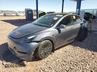 2022 Tesla Model Y Long Range z VIN 7SAYGDEE3NF543705, wystawiony jako Copart lot #50244955 z przebiegiem 59 063 mil mil oraz Szkody całkowita. Historia ofert i sprzedaży dostępna na DreamBid. Obrazek 1.
