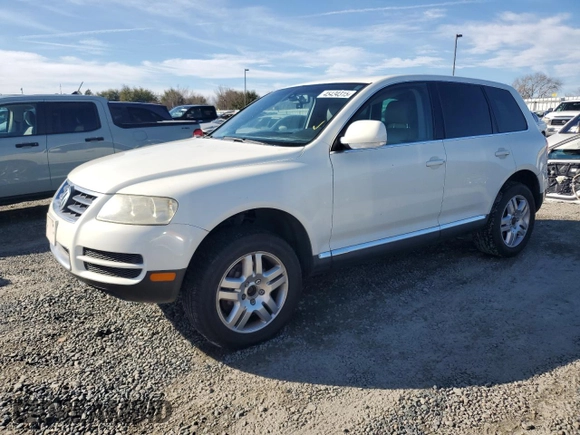 2004 Volkswagen Touareg z VIN WVGCM77L04D040938, wystawiony jako Copart lot #45434315 z przebiegiem 140 769 mil mil oraz Czysty tytuł • Clean title. Historia ofert i sprzedaży dostępna na DreamBid. Obrazek 1.