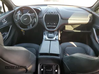 2021 Aston Martin DBX z VIN SCFVUJAW8MTV02134, wystawiony jako Copart lot #72456004 z przebiegiem Nie podano mil oraz Szkody całkowita. Historia ofert i sprzedaży dostępna na DreamBid. Obrazek 8.