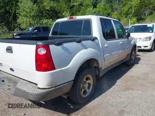 2005 Ford Explorer Sport Trac XLS z VIN 1FMZU67K25UB92409, wystawiony jako IAAI lot #42799036 z przebiegiem 150 554 mil mil oraz . Historia ofert i sprzedaży dostępna na DreamBid. Obrazek 4.