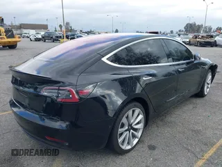 2018 Tesla Model 3 Long Range Battery with VIN 5YJ3E1EA9JF009384, listed as a IAAI auction lot 41544624 with 66,896 mi miles and . Bid and sale history available at DreamBid. Image 4.