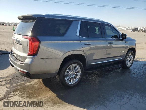 2021 GMC Yukon SLT with VIN 1GKS1BKD9MR194633, listed as a Copart auction lot 48762645 with 56,502 mi miles and Salvage Title. Bid and sale history available at carsss.com. Image 3.