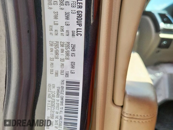 2014 Jeep Grand Cherokee Limited with VIN 1C4RJFBG9EC121990, listed as a Copart auction lot 64079495 with 98,615 mi miles and Salvage title. Bid and sale history available at DreamBid. Image 12.