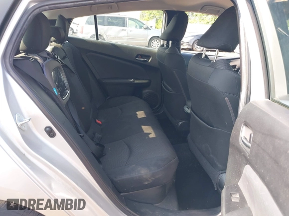 2022 Toyota Prius L Eco z VIN JTDKAMFU2N3165805, wystawiony jako IAAI lot #42428676 z przebiegiem 435 471 mil mil oraz . Historia ofert i sprzedaży dostępna na DreamBid. Obrazek 8.