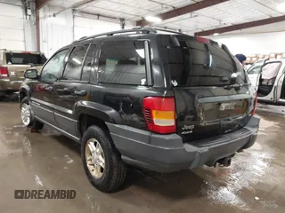2004 Jeep Grand Cherokee Laredo with VIN 1J4GW48N84C367215, listed as a IAAI auction lot 41352098 with 165,485 mi miles and . Bid and sale history available at DreamBid. Image 3.