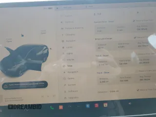 2024 Tesla Model Y с VIN 7SAYGDED2RF040079, выставлен на аукционе Copart как лот 61415675 с пробегом 2 549 миль миль и На запчасти • Non repairable. История ставок и продаж доступна на DreamBid. Изображение 9.