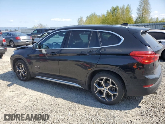 2017 BMW X1 xDrive28i with VIN WBXHT3C32H5F82141, listed as a Copart auction lot 53311785 with 52,867 mi miles and Salvage Title. Bid and sale history available at carsss.com. Image 2.