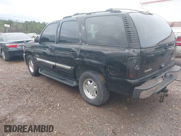 2003 GMC Yukon SLT with VIN 1GKEC13Z43J327937, listed as a IAAI auction lot 41543517 with 277,485 mi miles. Bid and sale history available at carsss.com. Image 3.