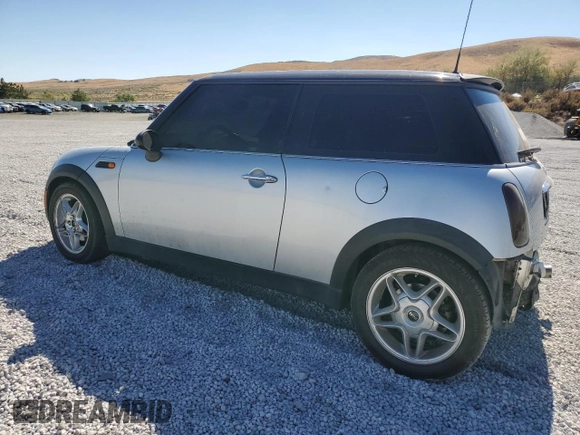 2002 MINI Hardtop with VIN WMWRC33472TC34281, listed as a Copart auction lot 71631644 with 196,947 mi miles and Salvage Title. Bid and sale history available at DreamBid. Image 2.