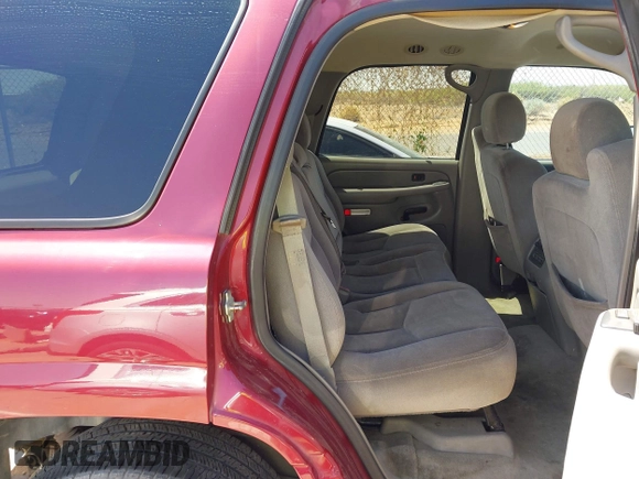2004 GMC Yukon SLT with VIN 1GKEK13Z44R301456, listed as a IAAI auction lot 42056635 with 196,799 mi miles. Bid and sale history available at carsss.com. Image 8.