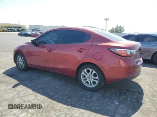 2016 Scion iA z VIN 3MYDLBZV3GY122064, wystawiony jako Copart lot #57616435 z przebiegiem 100 556 mil mil oraz Szkoda całkowita • Salvage title. Historia ofert i sprzedaży dostępna na DreamBid. Obrazek 2.