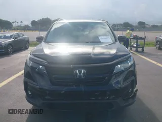 2022 Honda Pilot Special Edition with VIN 5FNYF5H25NB026414, listed as a IAAI auction lot 42590493 with 26,600 mi miles and . Bid and sale history available at DreamBid. Image 12.