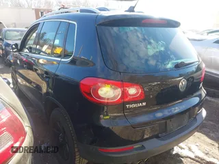 2011 Volkswagen Tiguan SE with VIN WVGBV7AXXBW511550, listed as a IAAI auction lot 41630804 with 99,967 mi miles and . Bid and sale history available at DreamBid. Image 3.