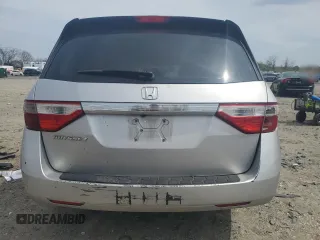 2013 Honda Odyssey LX z VIN 5FNRL5H28DB085114, wystawiony jako Copart lot #52942495 z przebiegiem 158 191 mil mil oraz Szkoda całkowita • Salvage title. Historia ofert i sprzedaży dostępna na DreamBid. Obrazek 6.