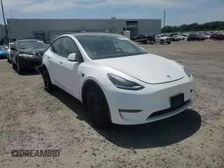 2022 Tesla Model Y Long Range z VIN 7SAYGDEE9NF455614, wystawiony jako Copart lot #57612985 z przebiegiem 22 101 mil mil oraz Szkoda całkowita • Salvage title. Historia ofert i sprzedaży dostępna na DreamBid. Obrazek 13.