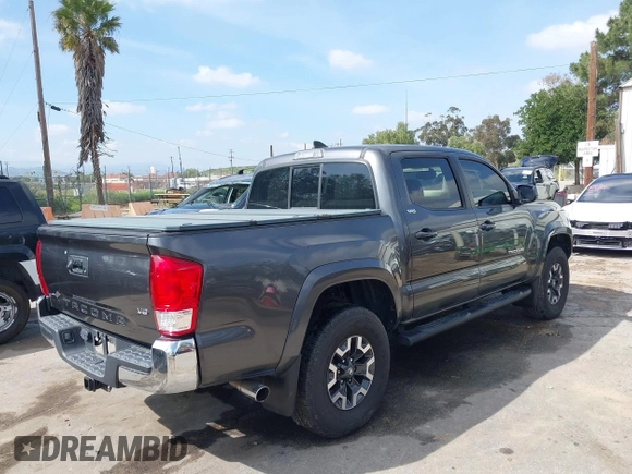 2017 Toyota Tacoma SR5 with VIN 3TMAZ5CN6HM050456, listed as a IAAI auction lot 38968606 with 48,576 mi miles and . Bid and sale history available at DreamBid. Image 4.