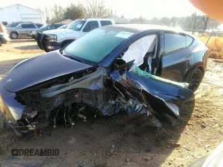 2022 Tesla Model Y Long Range with VIN 7SAYGDEE9NF424928, listed as a IAAI auction lot 41807225 with Not Provided miles and . Bid and sale history available at carsss.com. Image 18.