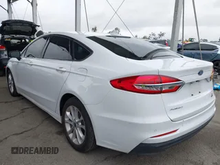 2020 Ford Fusion SE z VIN 3FA6P0LU6LR113532, wystawiony jako IAAI lot #41794966 z przebiegiem 50 128 mil mil oraz . Historia ofert i sprzedaży dostępna na DreamBid. Obrazek 3.
