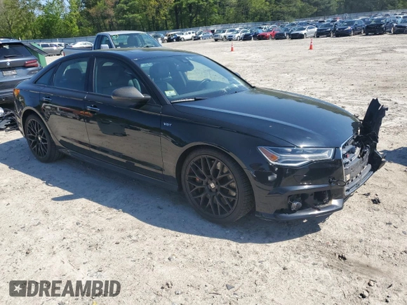 2016 Audi S6 Premium Plus z VIN WAUF2AFC2GN066099, wystawiony jako Copart lot #56342625 z przebiegiem 100 787 mil mil oraz Szkody całkowita. Historia ofert i sprzedaży dostępna na DreamBid. Obrazek 4.