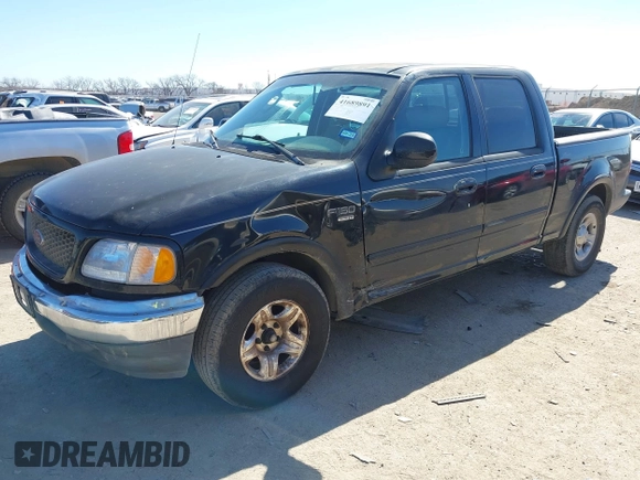 2003 Ford F-150 XLT with VIN 1FTRW07L83KC62296, listed as a IAAI auction lot 41689891 with 272,210 mi miles. Bid and sale history available at carsss.com. Image 2.