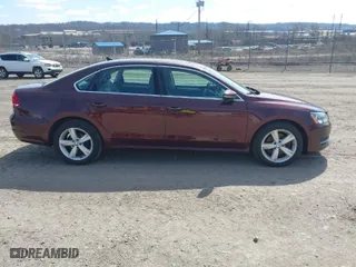 2012 Volkswagen Passat SE w/Sunroof with VIN 1VWBP7A3XCC054072, listed as a IAAI auction lot 41863852 with 113,134 mi miles. Bid and sale history available at carsss.com. Image 13.