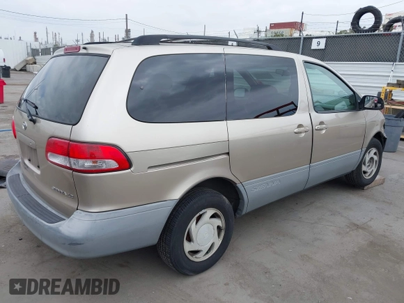 2002 Toyota Sienna LE with VIN 4T3ZF13C92U469670, listed as a IAAI auction lot 42141259 with 222,299 mi miles and . Bid and sale history available at DreamBid. Image 4.
