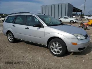 2005 Ford Focus SE with VIN 1FAFP36N75W299099, listed as a Copart auction lot 51410635 with 160,652 mi miles and Salvage Title. Bid and sale history available at carsss.com. Image 4.