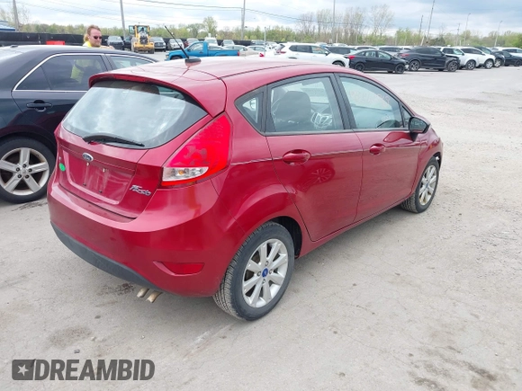 2013 Ford Fiesta SE with VIN 3FADP4EJXDM152463, listed as a IAAI auction lot 42122969 with 66,952 mi miles and . Bid and sale history available at DreamBid. Image 4.