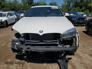 2019 BMW X6 xDrive50i with VIN 5UXKU6C56K0Z67074, listed as a Copart auction lot 65494064 with 97,702 mi miles and Salvage Title. Bid and sale history available at carsss.com. Image 5.