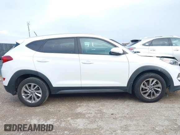 2016 Hyundai Tucson Sport with VIN KM8J33A2XGU242256, listed as a IAAI auction lot 41065573 with 97,503 mi miles. Bid and sale history available at carsss.com. Image 14.