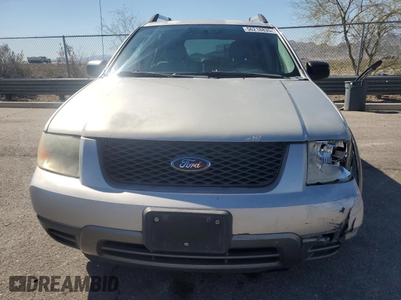 2006 Ford Freestyle SE z VIN 1FMZK011X6GA00401, wystawiony jako Copart lot #56218835 z przebiegiem 148 590 mil mil oraz Szkoda całkowita • Salvage title. Historia ofert i sprzedaży dostępna na DreamBid. Obrazek 5.