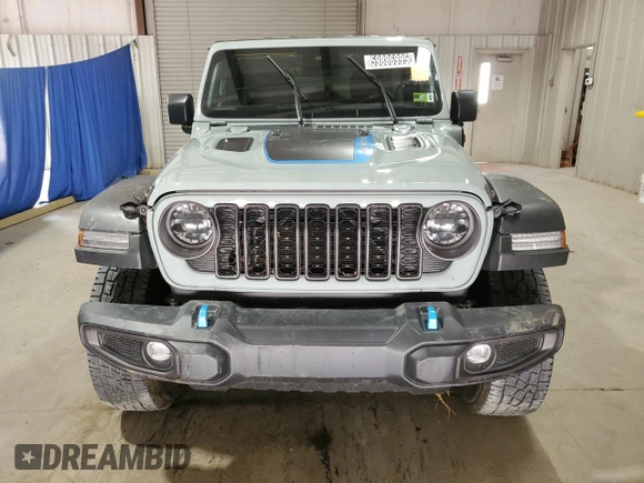 2024 Jeep Wrangler Rubicon with VIN 1C4RJXR67RW293197, listed as a Copart auction lot 59886995 with Not provided miles and Salvage title. Bid and sale history available at DreamBid. Image 5.