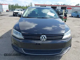 2013 Volkswagen Jetta SE z VIN 3VWDP7AJ6DM406961, wystawiony jako IAAI lot #42107384 z przebiegiem 132 547 mil mil oraz . Historia ofert i sprzedaży dostępna na DreamBid. Obrazek 13.
