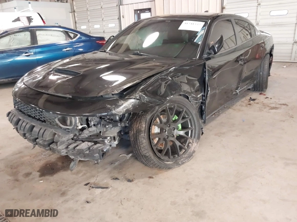 2018 Dodge Charger R/T with VIN 2C3CDXCT1JH340131, listed as a IAAI auction lot 41241332 with 63,801 mi miles. Bid and sale history available at carsss.com. Image 6.
