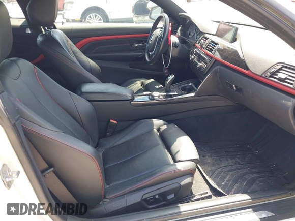 2015 BMW 4 Series 428i xDrive z VIN WBA3N5C58FK198825, wystawiony jako IAAI lot #41919172 z przebiegiem 125 421 mil mil oraz . Historia ofert i sprzedaży dostępna na DreamBid. Obrazek 5.